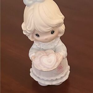 Precious Moments figurine titled "You're the Sweetest Cookie in the Batch".